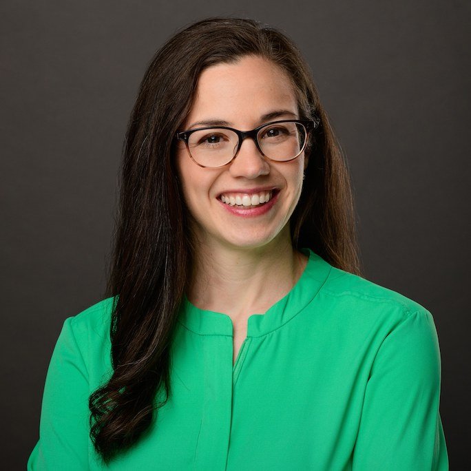 Headshot of Lianna Bishop wearing a green long-sleeved blouse.